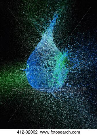 High speed image of water balloon popping View Large Photo Image Stock Image - High speed image of water balloon popping. Fotosearch