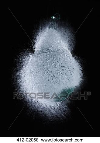 High speed image of water balloon popping View Large Photo Image Stock Photo - High speed image of water balloon popping. Fotosearch