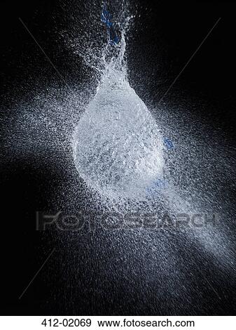High speed image of water balloon popping View Large Photo Image Stock Photo - High speed image of water balloon popping. Fotosearch