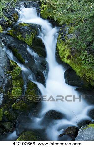 River rushing over rocky hillside View Large Photo Image Stock Photograph - River rushing over rocky hillside. Fotosearch
