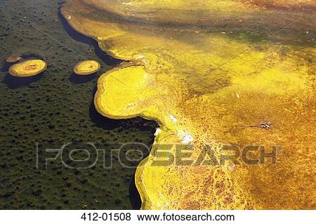 Rock formations and colorful pool View Large Photo Image Stock Photo - Rock formations and colorful pool. Fotosearch