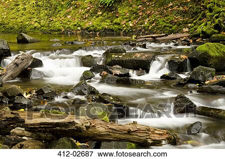 Rocky river in rural landscape View Large Photo Image Stock Photo - Rocky river in rural landscape. Fotosearch