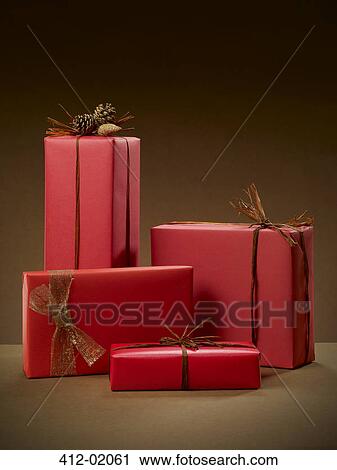 Stack of wrapped Christmas presents View Large Photo Image Stock Image - Stack of wrapped Christmas presents. Fotosearch