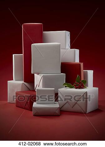 Stack of wrapped Christmas presents View Large Photo Image Stock Photo - Stack of wrapped Christmas presents. Fotosearch