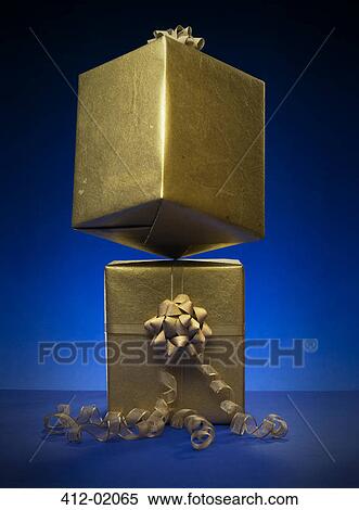 Stack of wrapped Christmas presents View Large Photo Image Stock Photography - Stack of wrapped Christmas presents. Fotosearch