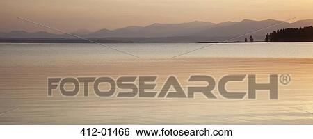 Sunset sky reflected in rural lake View Large Photo Image Stock Photograph - Sunset sky reflected in rural lake. Fotosearch