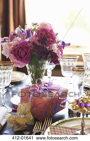 Stock Image - Table set for wedding reception. Fotosearch