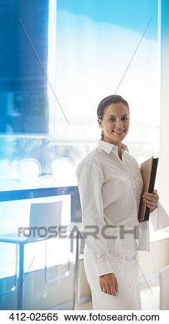 Waitress smiling in restaurant View Large Photo Image Stock Photography - Waitress smiling in restaurant. Fotosearch