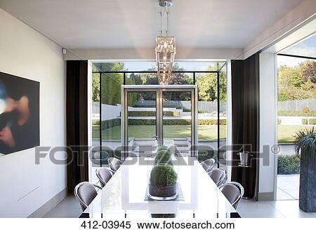 Centerpieces on table in modern dining room View Large Photo Image Stock Photography - Centerpieces on table in modern dining room. Fotosearch