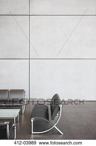 Chairs and table in office lobby area View Large Photo Image Stock Photo - Chairs and table in office lobby area. Fotosearch