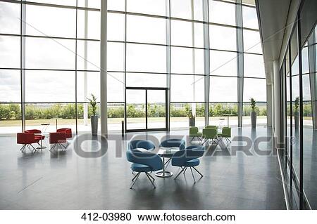 Chairs and tables in office lobby area View Large Photo Image Stock Image - Chairs and tables in office lobby area. Fotosearch