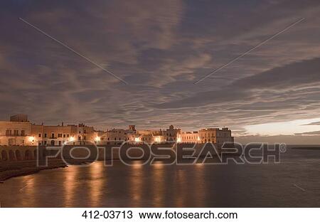 City lights reflecting in still ocean View Large Photo Image Stock Image - City lights reflecting in still ocean. Fotosearch