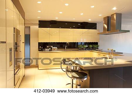 Counters and lighting in modern kitchen View Large Photo Image Stock Photo - Counters and lighting in modern kitchen. Fotosearch