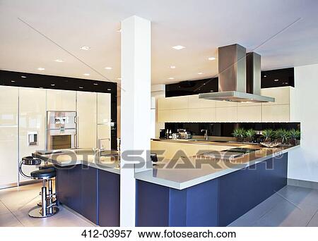 Counters and stove in modern kitchen View Large Photo Image Stock Photo - Counters and stove in modern kitchen. Fotosearch