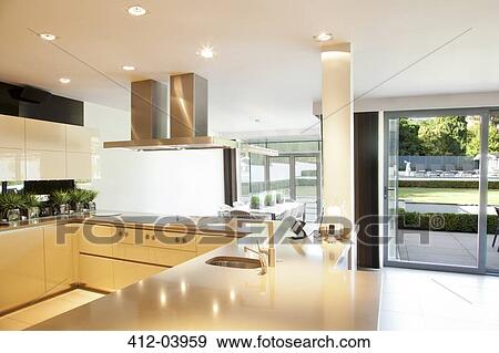 Counters and stove in modern kitchen View Large Photo Image Stock Photo - Counters and stove in modern kitchen. Fotosearch