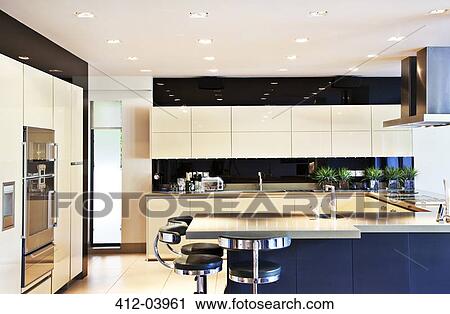 Counters and table in modern kitchen View Large Photo Image Stock Image - Counters and table in modern kitchen. Fotosearch