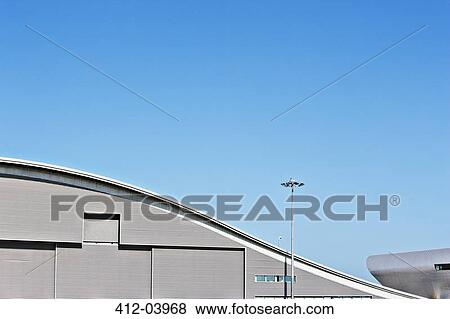 Curved roof and blue sky View Large Photo Image Stock Photo - Curved roof and blue sky. Fotosearch