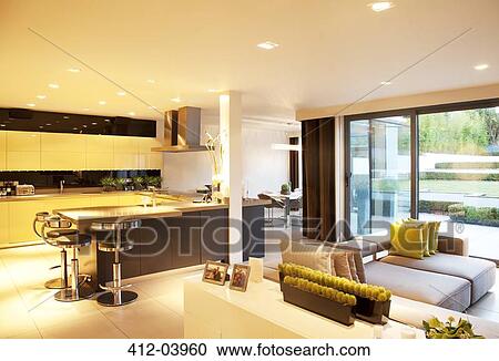 Kitchen and living room in modern home View Large Photo Image Stock Image - Kitchen and living room in modern home. Fotosearch
