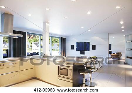 Kitchen and living room in modern home View Large Photo Image Stock Image - Kitchen and living room in modern home. Fotosearch