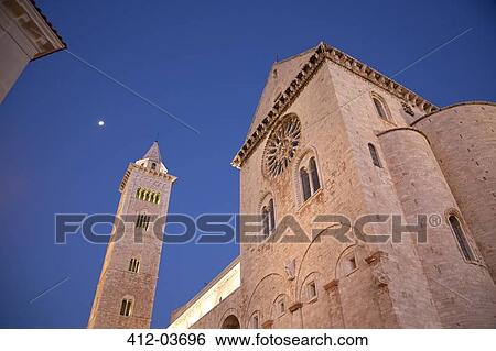 Stock Photograph - Low angle view of church and bell tower. Fotosearch