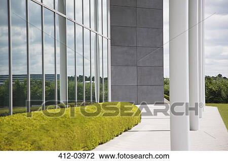 Manicured hedges and glass windows View Large Photo Image Stock Image - Manicured hedges and glass windows. Fotosearch
