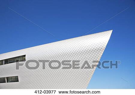 Modern building against blue sky View Large Photo Image Stock Photo - Modern building against blue sky. Fotosearch