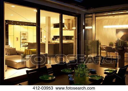 Outdoor table and living room of modern home View Large Photo Image Stock Image - Outdoor table and living room of modern home. Fotosearch