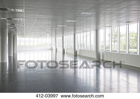 Pillars in empty office building View Large Photo Image Stock Photo - Pillars in empty office building. Fotosearch