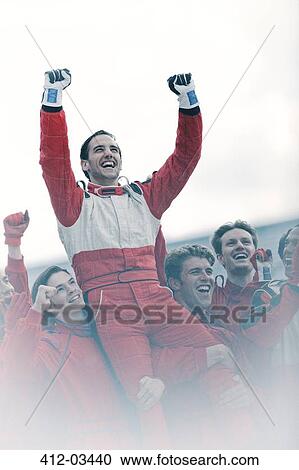 Racer and team cheering on track View Large Photo Image Stock Image - Racer and team cheering on track. Fotosearch