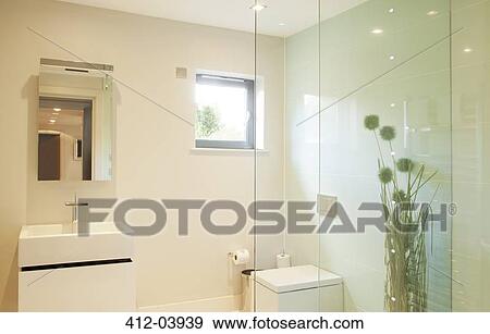 Stock Photo - Shower and sink in modern bathroom. Fotosearch