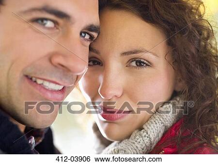 Smiling couple hugging View Large Photo Image Stock Photograph - Smiling couple hugging. Fotosearch