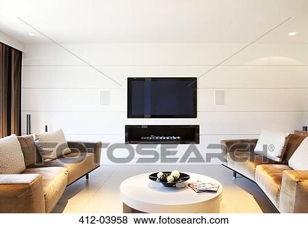 Stock Photo - Sofa and television in modern living room. Fotosearch