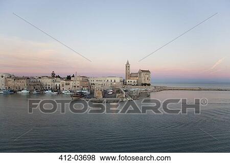 Town on island in still rural lake View Large Photo Image Stock Photo - Town on island in still rural lake. Fotosearch