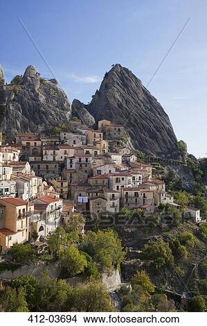 Village on hillside in rural landscape View Large Photo Image Picture - Village on hillside in rural landscape. Fotosearch
