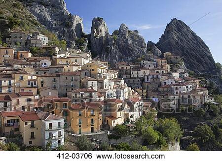 Village on hillside in rural landscape View Large Photo Image Stock Photograph - Village on hillside in rural landscape. Fotosearch