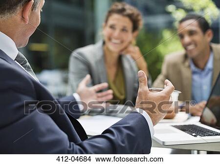 Business people talking in meeting View Large Photo Image Picture - Business people talking in meeting. Fotosearch
