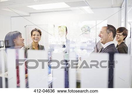 Business people talking in meeting View Large Photo Image Stock Photograph - Business people talking in meeting. Fotosearch