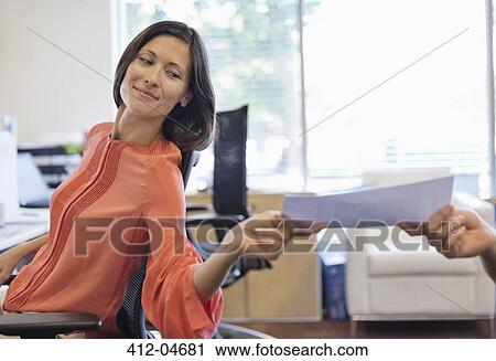 Business people working together in office View Large Photo Image Stock Image - Business people working together in office. Fotosearch