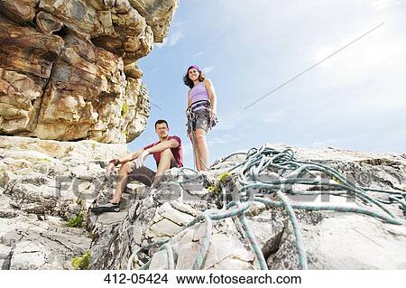 Climbers with rope on rock formation View Large Photo Image Picture - Climbers with rope on rock formation. Fotosearch