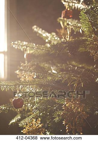 Close up of decorated Christmas tree View Large Photo Image Stock Photo - Close up of decorated Christmas tree. Fotosearch
