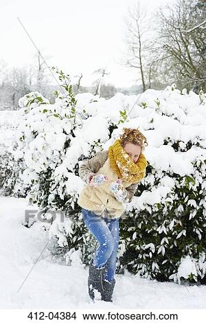 Girl playing in snow View Large Photo Image Picture - Girl playing in snow. Fotosearch