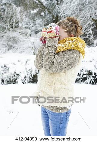 Girl playing in snow View Large Photo Image Stock Image - Girl playing in snow. Fotosearch