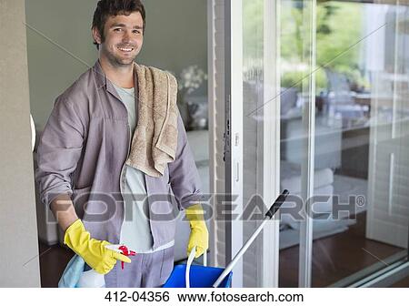 Man carrying bucket of cleaning supplies View Large Photo Image Stock Photograph - Man carrying bucket of cleaning supplies. Fotosearch