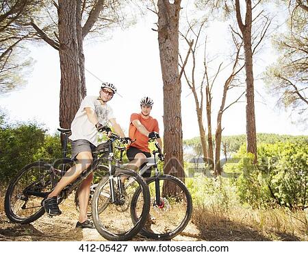 mountain bikers on dirt path View Large Photo Image Stock Photo - mountain bikers on dirt path. Fotosearch