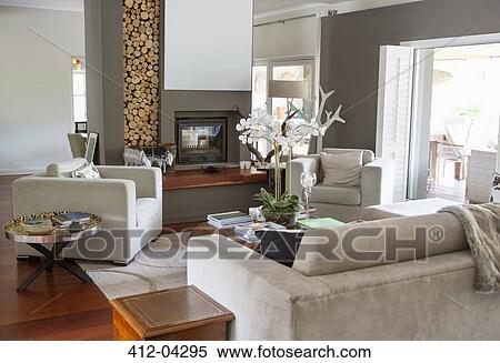 Sofa and armchairs in modern living room View Large Photo Image Stock Photography - Sofa and armchairs in modern living room. Fotosearch