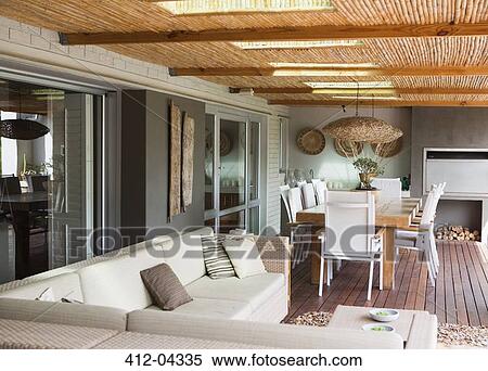 Sofa and table on modern patio View Large Photo Image Stock Photography - Sofa and table on modern patio. Fotosearch