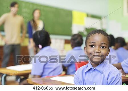 Student smiling in class View Large Photo Image Stock Photography - Student smiling in class. Fotosearch