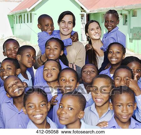 Stock Photo - Students and teachers smiling outdoors. Fotosearch