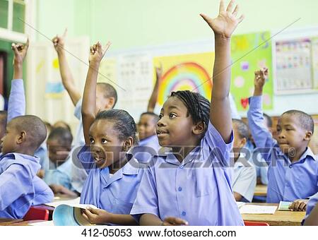 Students raising hands in class View Large Photo Image Stock Image - Students raising hands in class. Fotosearch
