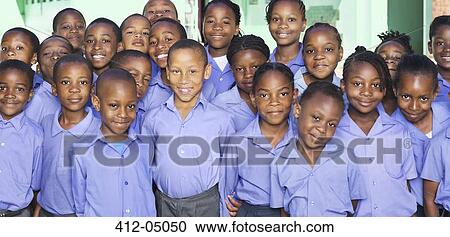 Students smiling together in classroom View Large Photo Image Stock Image - Students smiling together in classroom. Fotosearch